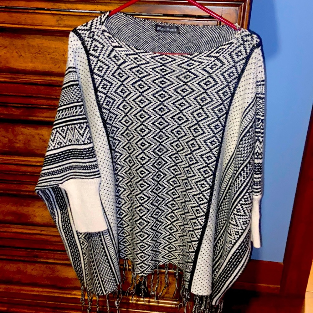 Beautiful tan with black poncho size M with bat sleeves